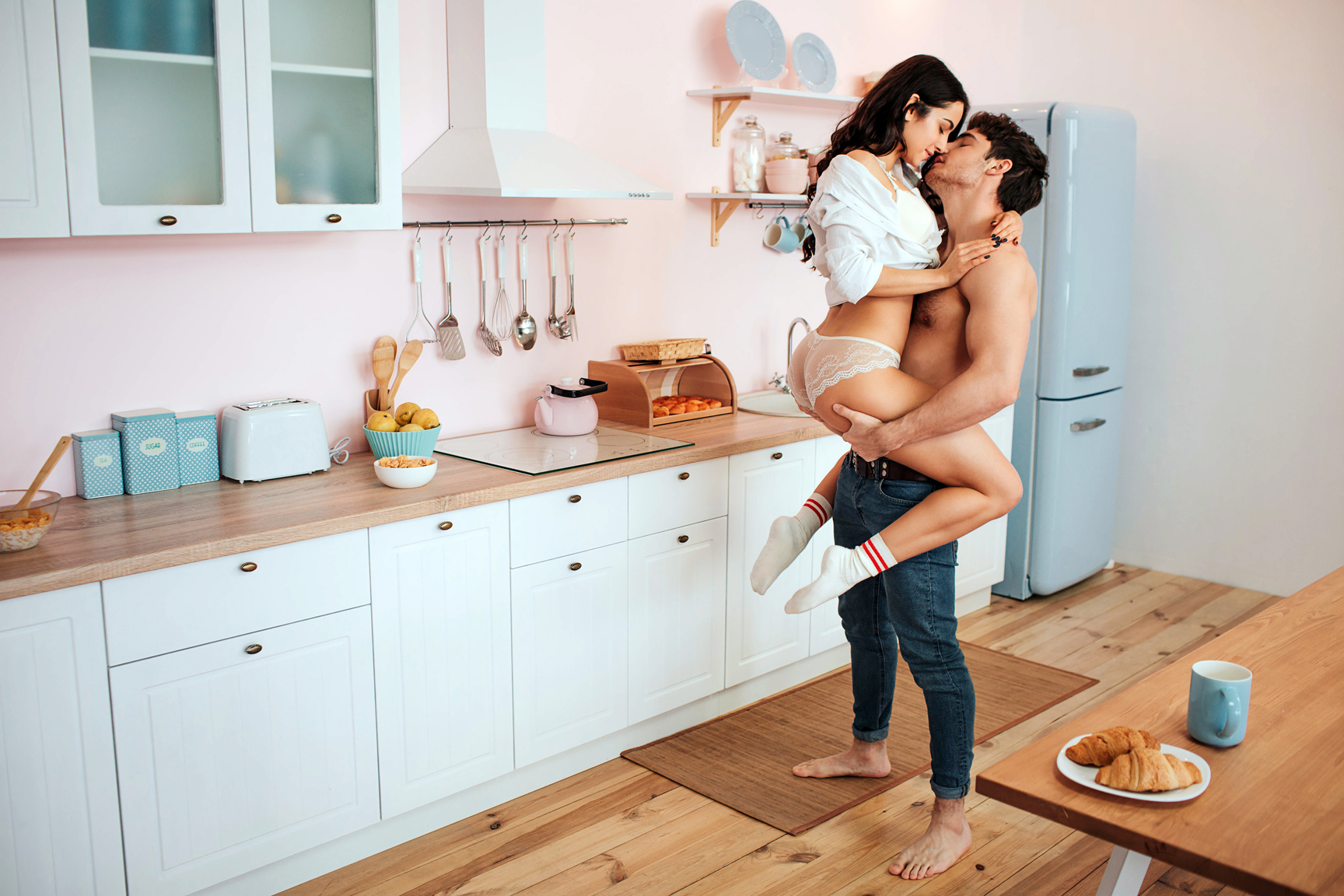 Sexy Young Couple in the Kitchen